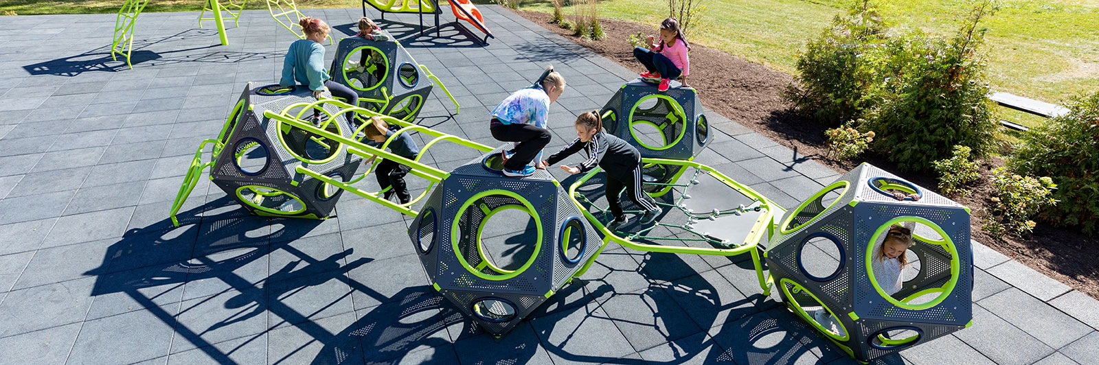 Arial shot of a large playground made with structural playcubes made with steel.